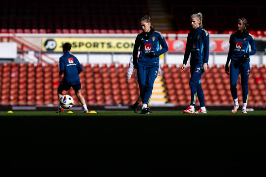Filippa Angeldahl, Sofia Jakobsson and Evelyn Ijeh  of the Swedish women's national football team at a training session