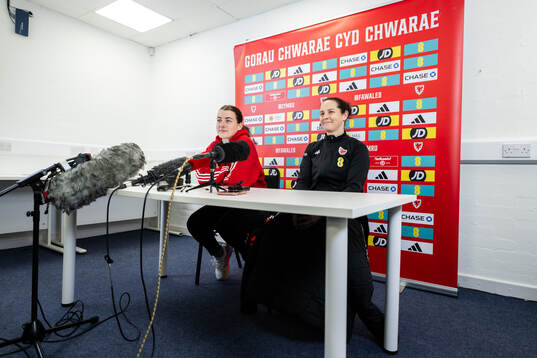 Angharad James and head coach Rhian Wilkinson of the Welsh women's national football team at a press conference
