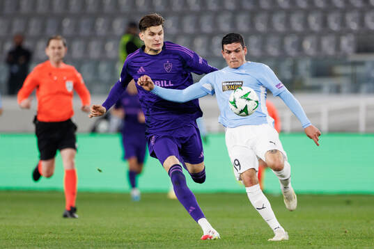 Nino Žugelj of Djurgården and Jonathan Silva of Pafos