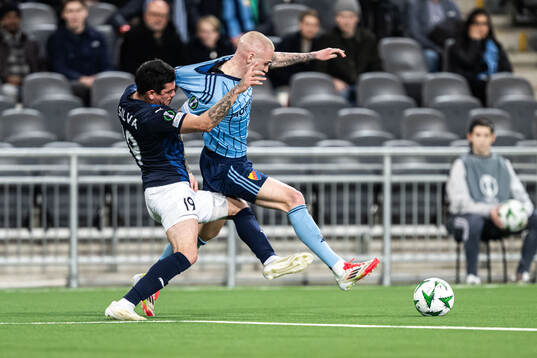 Jonathan Silva of Pafos and Adam Ståhl of Djurgården