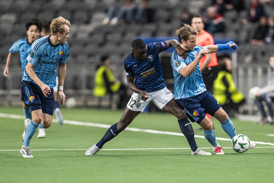 Ken Sema of Pafos and Oskar Fallenius and Daniel Stensson of Djurgården