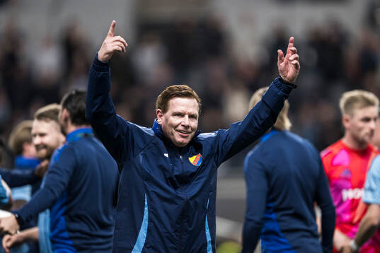 Assistant coach Christer Mattiasson celebrates
