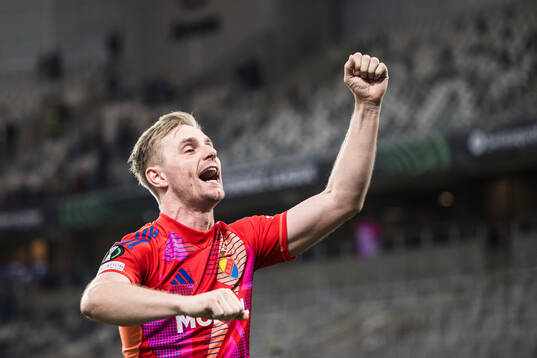 Goalkeeper Jacob Rinne of Djurgården celebrates