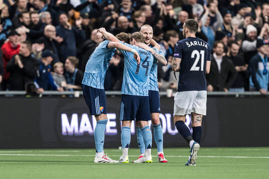 August Priske Flyger, Hampus Finndell and Adam Ståhl of Djurgården celebrate