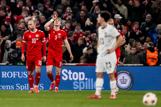 Rasmus Højlund of Denmark celebrates after 1-0