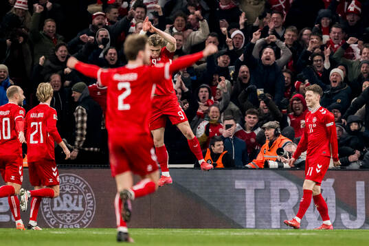 Rasmus Højlund of Denmark celebrates