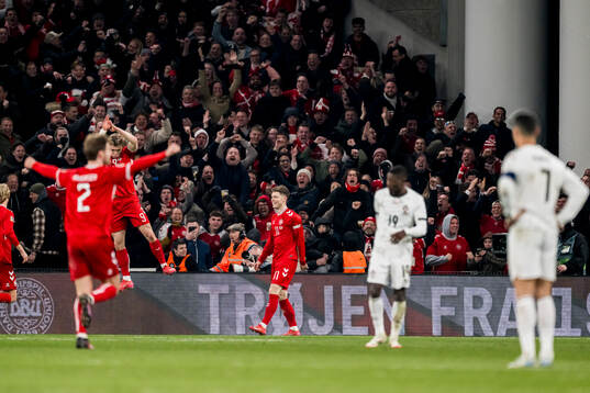 Rasmus Højlund of Denmark celebrates after 1-0