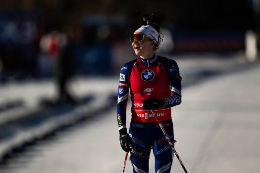 Lou Jeanmonnot of France celebrates after winning women's 10 km pursuit