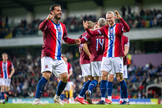 Aron Dønnum of Norway celebrates with teammate Erling Braut Haaland after scoring 0-5 during the FIFA World Cup Qualifier football match between Moldova and Norway on March 22, 2025 in Chisinau. 
