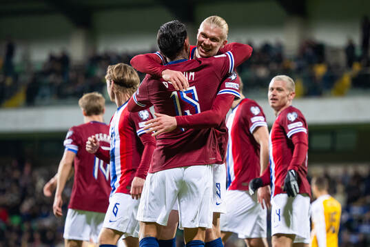 Aron Dønnum of Norway celebrates with teammate Erling Braut Haaland after scoring 0-5 during the FIFA World Cup Qualifier football match between Moldova and Norway on March 22, 2025 in Chisinau. 
