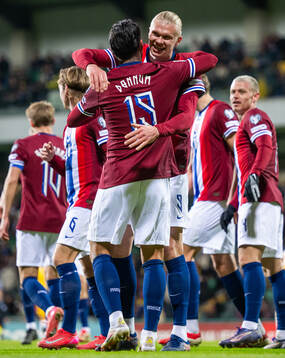 Aron Dønnum of Norway celebrates with teammate Erling Braut Haaland after scoring 0-5 during the FIFA World Cup Qualifier football match between Moldova and Norway on March 22, 2025 in Chisinau. 
