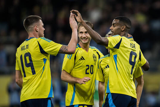 Alexander Isak, Benjamin Nygren and Emil Holm, of Sweden celebrating the 4-0 goal