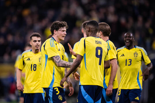 Victor Nilsson Lindelöf and Alexander Isak of Sweden celebrate after 4-0