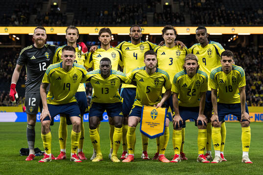 The starting eleven of Sweden pose for a team photo Top