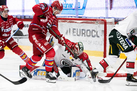 Timrås Filip Hållander och Frölundas Lars Johansson