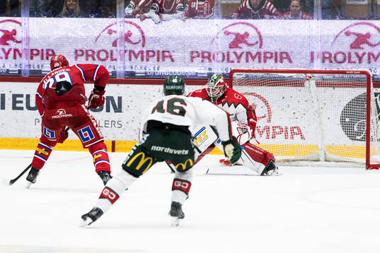 Timrås Filip Hållander och Frölundas Lars Johansson