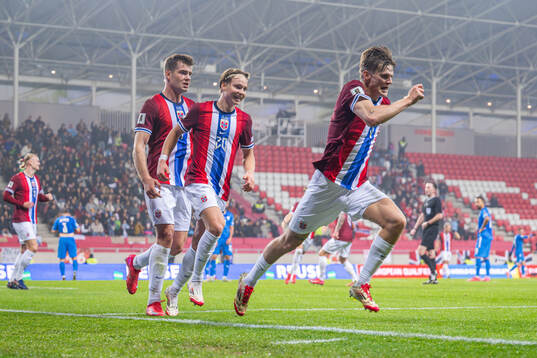 David Møller Wolfe of Norway celebrates with teammates Alexander Sørloth and Andreas Schjelderup after scoring 0-1