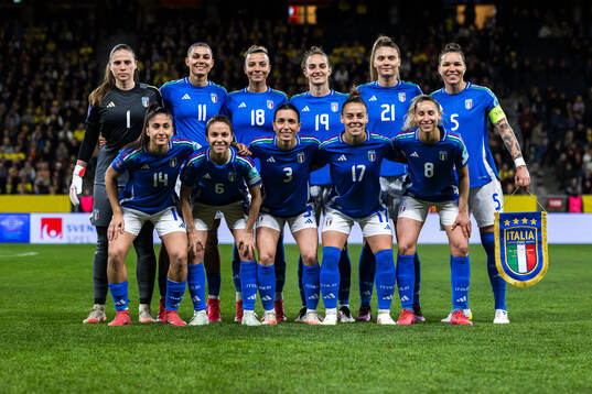 The starting eleven of Italy pose for a photo ahed of