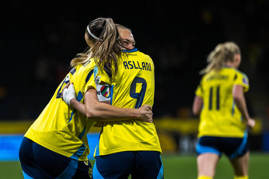 Magdalena Eriksson celebrates with Kosovare Asllani of Sweden who scored 1-1