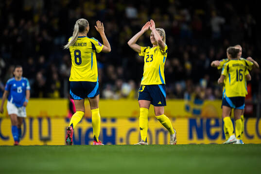 Ellen Wangerheim and Rebecka Blomqvist of Sweden celebrate