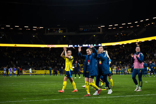 Magdalena Eriksson and Kosovare Asllani of Sweden celebrates