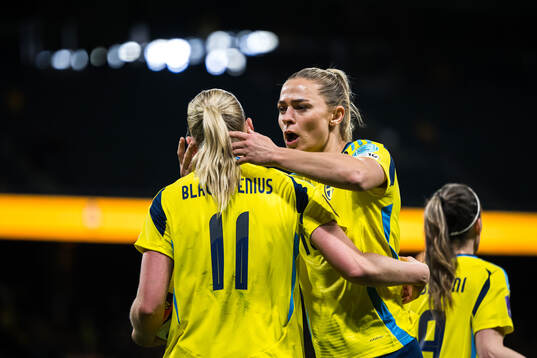 Stina Blackstenius and Fridolina Rolfö of Sweden celebrates
