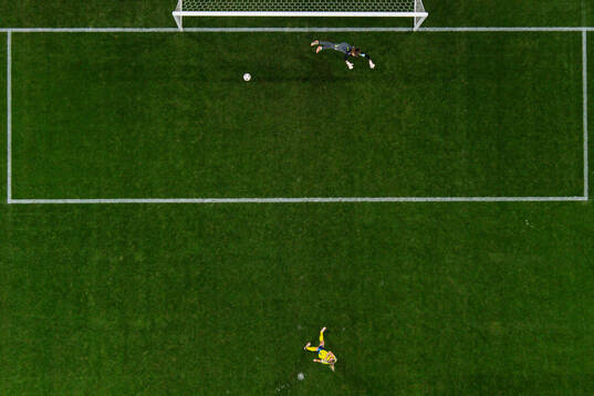 Fridolina Rolfö of Sweden scores the 3-2 goal behind goalkeeper Laura Giuliani of Italy