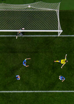 Kosovare Asllani of Sweden celebrates after scoring the 1-1 goal behind goalkeeper Laura Giuliani of Italy