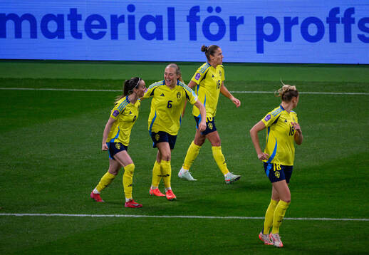 Kosovare Asllani, Magdalena Eriksson and Filippa Angeldahl of Sweden celebrate the 1-1 goal