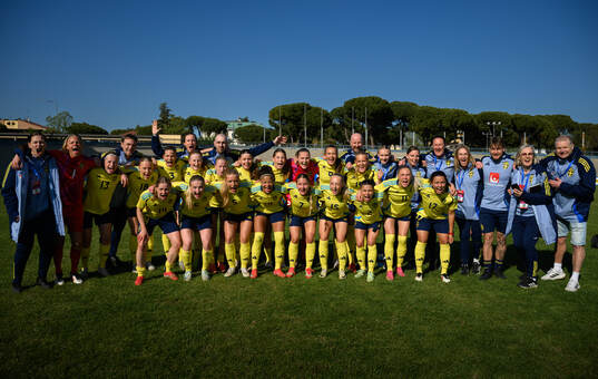 Players and staff of Sweden celebrate