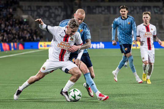 Moritz Oswald of Rapid Wien and Adam Ståhl of Djurgården