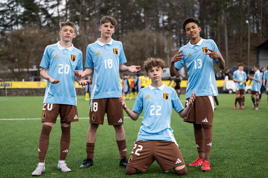 Victor Vanlessen, Tom Tomassetti, Logan Cappoen and Femi Siwoku of Belgium celebrate