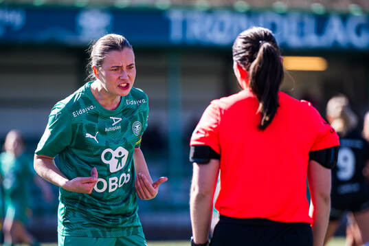 Sara Bræk of HamKam after receiving a yellow card by Aylin Kalak, referee,