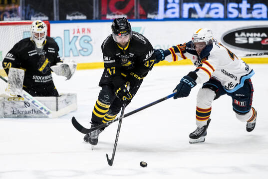 AIKs Eric Norin  och Djurgårdens Arvid Costmar