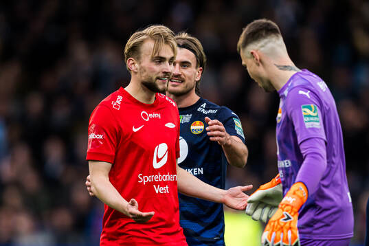 Mads Berg Sande of Brann and Per Kristian Bråtveit of Strømsgodset