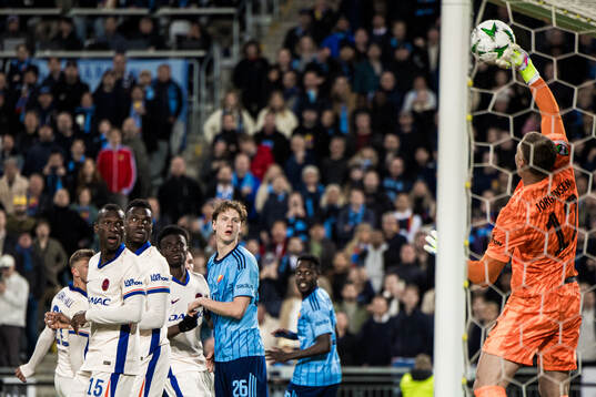 August Priske Flyger of Djurgården and goalkeeper Filip Jørgensen of Chelsea