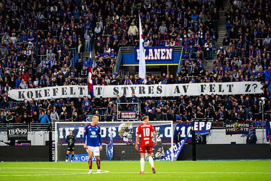 Spectators in the stands during the Eliteserien match between Vålerenga and Brann on May 3, 2025 in Oslo. 
