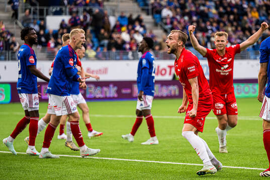 Mads Berg Sande of Brann celebrates after scoring the 2-3 goal