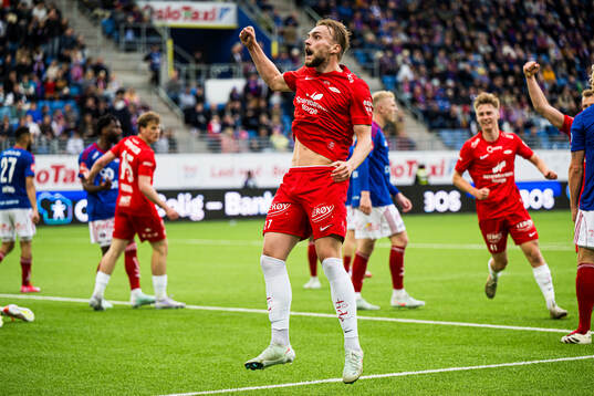 Mads Berg Sande of Brann celebrates after scoring the 2-3 goal
