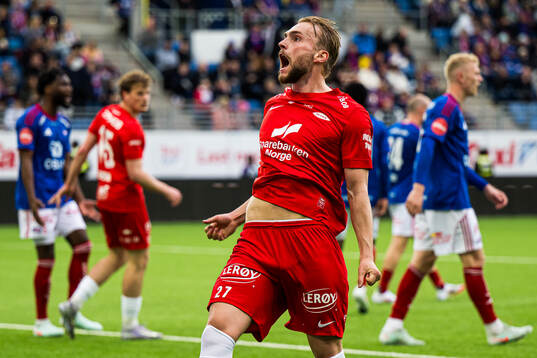 Mads Berg Sande of Brann celebrates after scoring the 2-3 goal