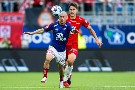 Petter Dahle Strand of Vålerenga and Eivind Helland of
