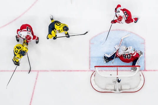 Mika Zibanejad sees Marcus Johansson of Sweden score 3-0