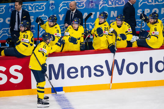 Mikael Backlund of Sweden celebrates with Mika Zibanejad,