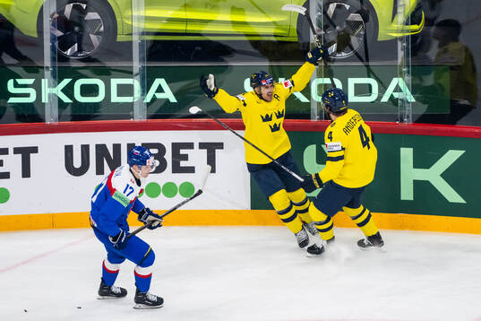 Mikael Backlund and Rasmus Andersson of Sweden celebrate