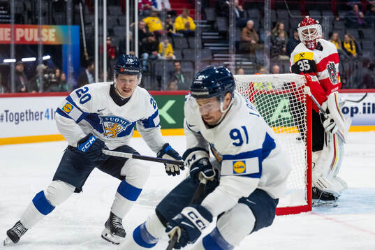 Eeli Tolvanen of Finland and goaltender Atte Tolvanen of