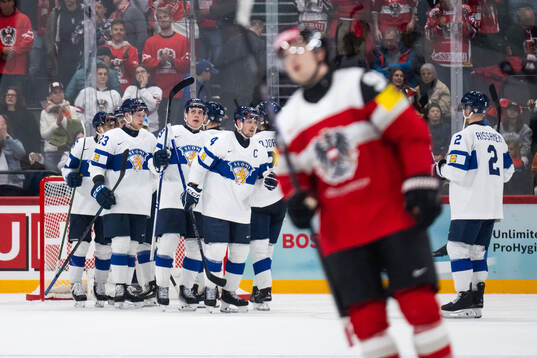 Mikko Lehtonen of Finland celebrates with team mates
