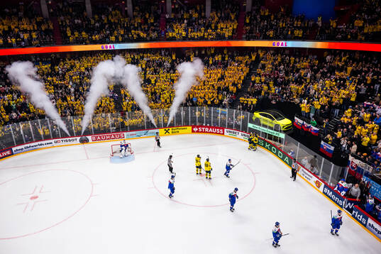 Mikael Backlund of Sweden celebrates with team mates