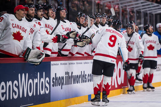 Nathan MacKinnon of Canada celebrates