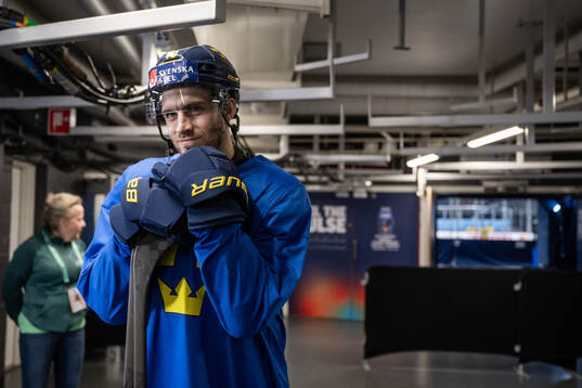 Alexander Wennberg of Sweden in the mixed zone after a practice session