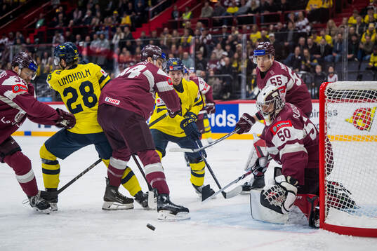 Jesper Frödén of Sweden against Roberts Mamcics and
